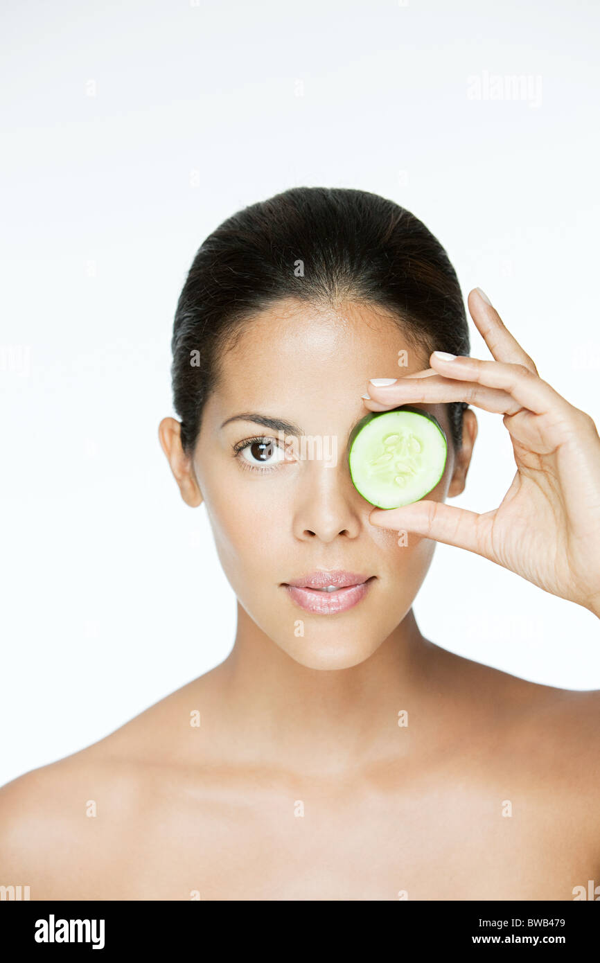 Woman with cucumber over eyes hires stock photography and images Alamy