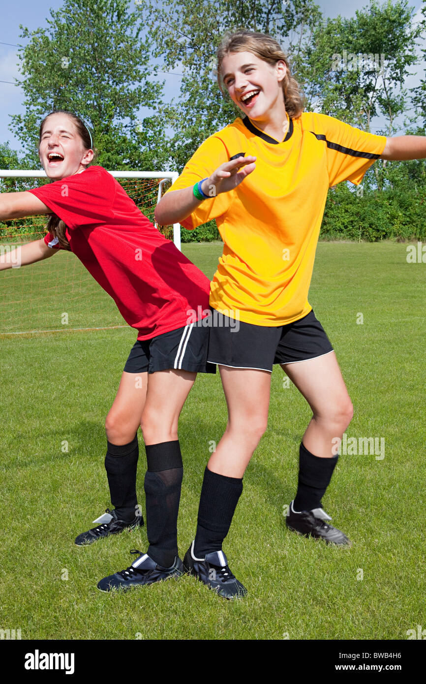 Girl soccer players messing around Stock Photo