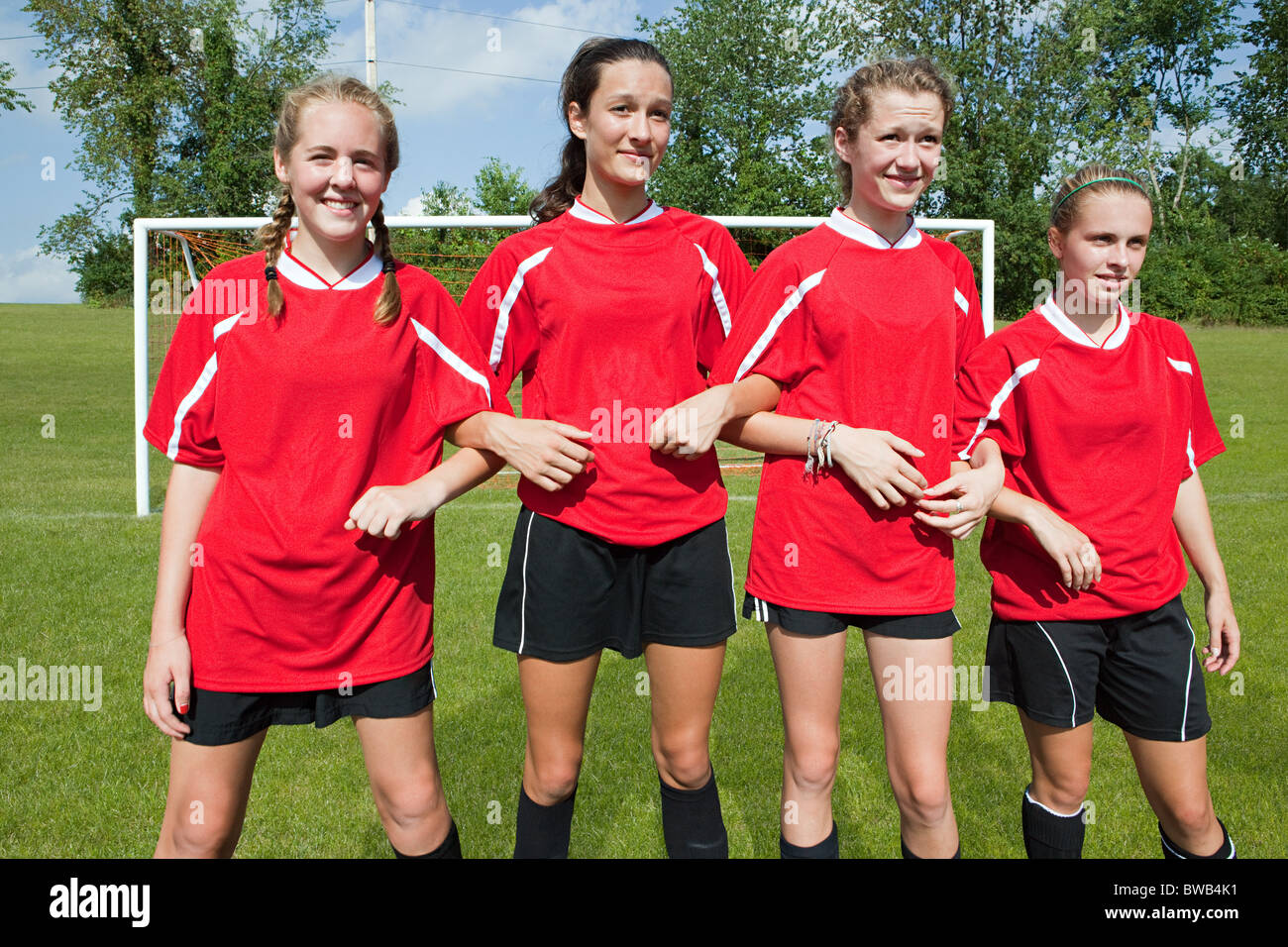 Girl soccer players make defensive wall Stock Photo