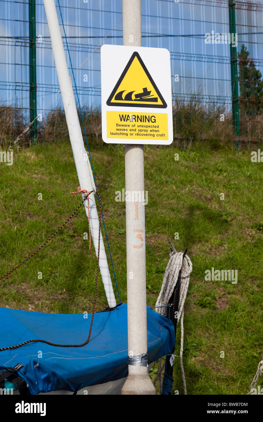 Warning sign - Beware of unexpected waves and spray Stock Photo - Alamy