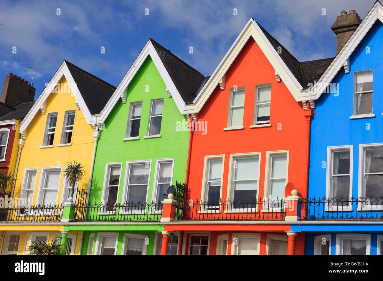 Colourful seafront properties at Whitehead Stock Photo Alamy