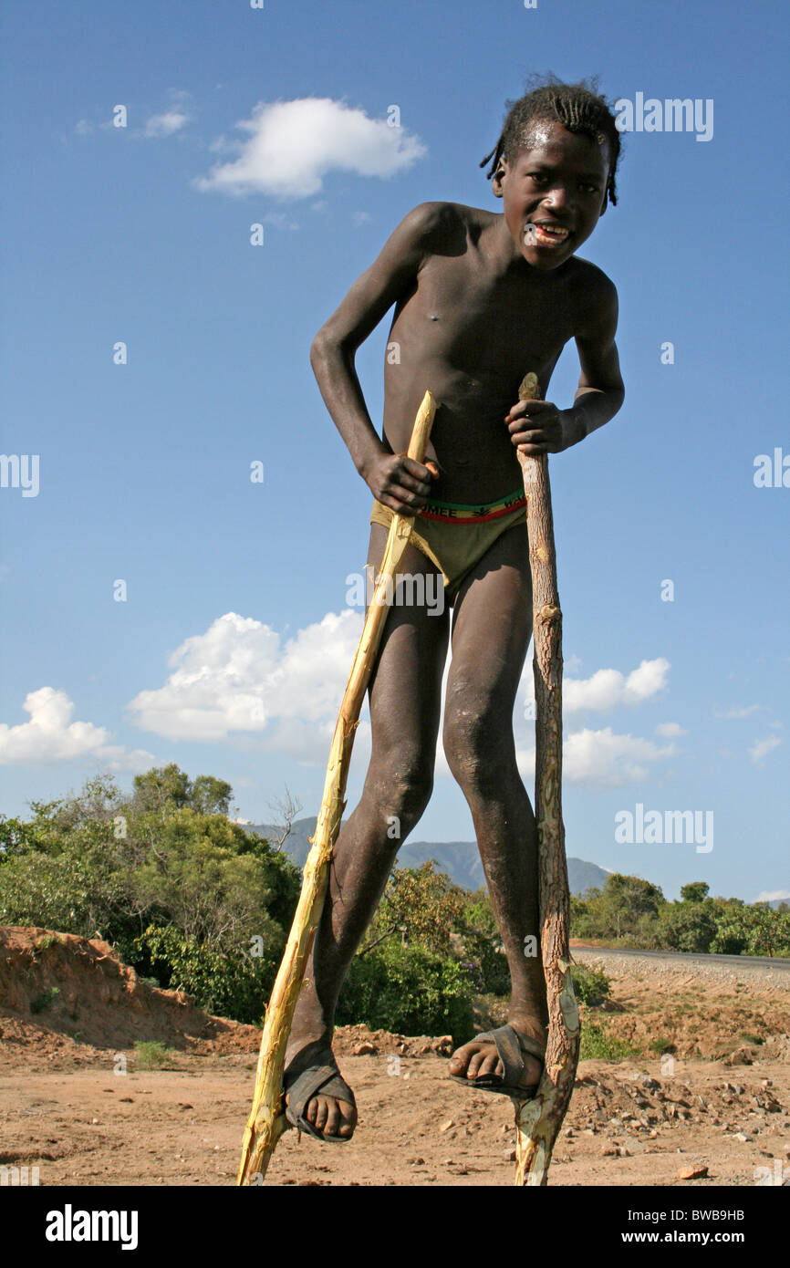 Young Tribal Boy On Silts, Omo Valley Ethiopia Stock Photo