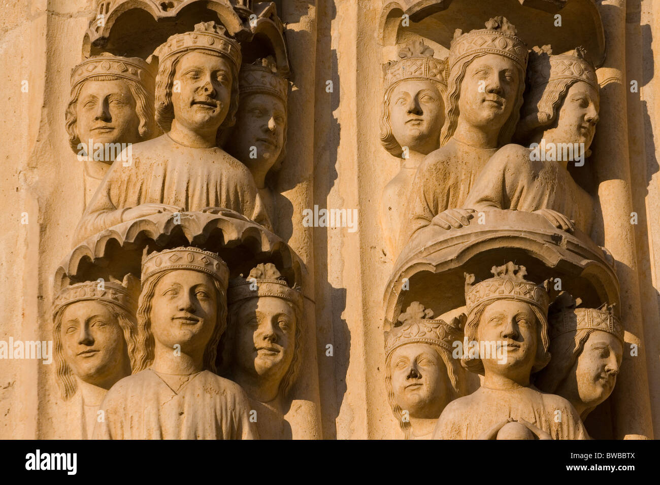 Statues on the portals of the west facade of Notre-Dame cathedral Stock Photo