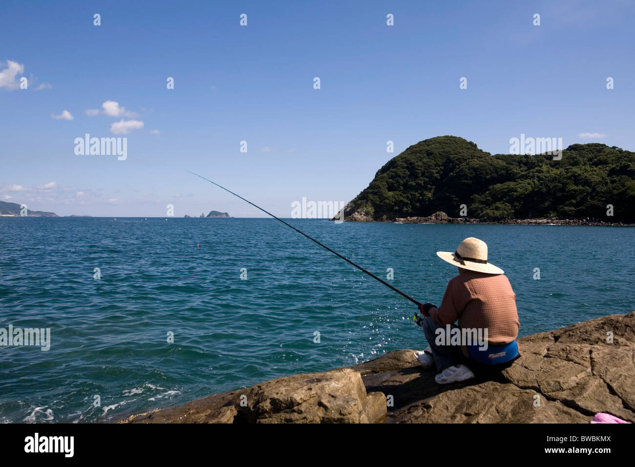 Man fishing, Hyuga City, Miyazaki prefecture, Japan Stock Photo