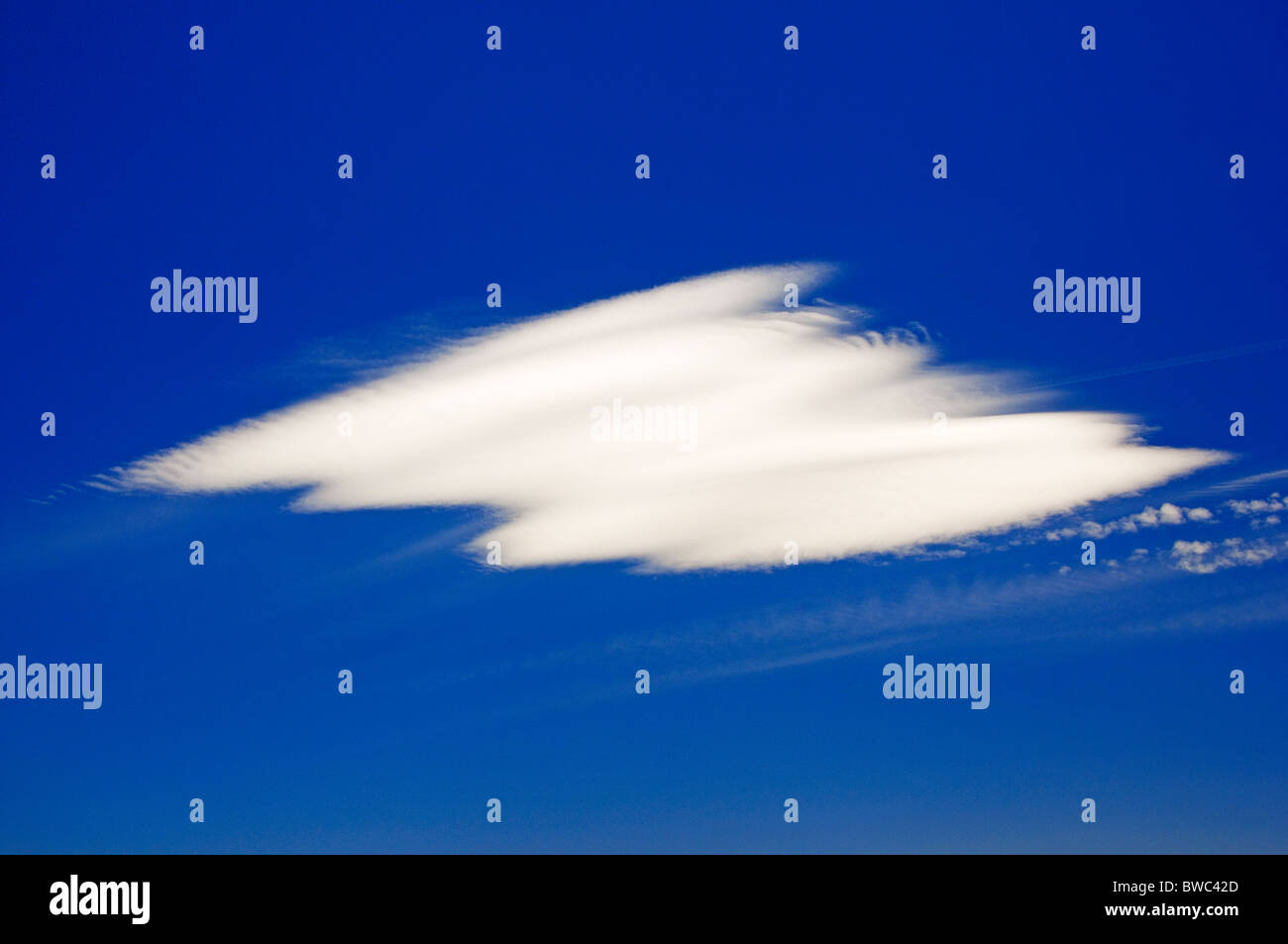Single cloud in New Mexico sky Stock Photo