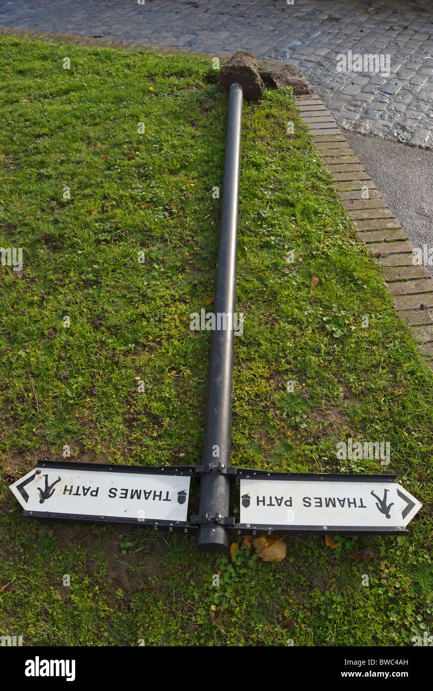 upended thames path signpost Stock Photo