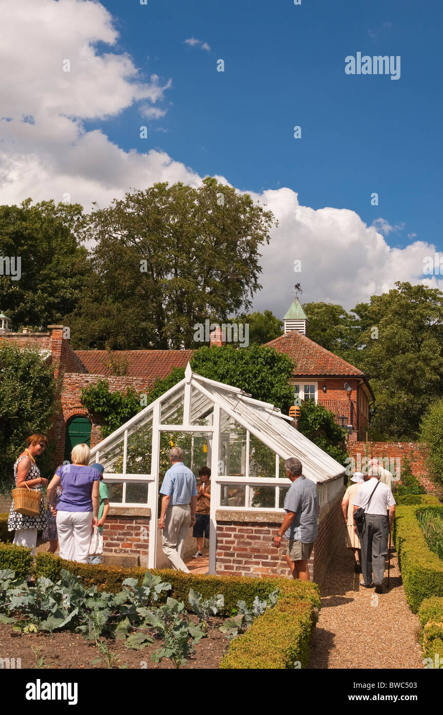 Visitors in the walled vegetable gardens at Redisham Hall open gardens in Redisham , Suffolk , England , Great Britain , Uk Stock Photo