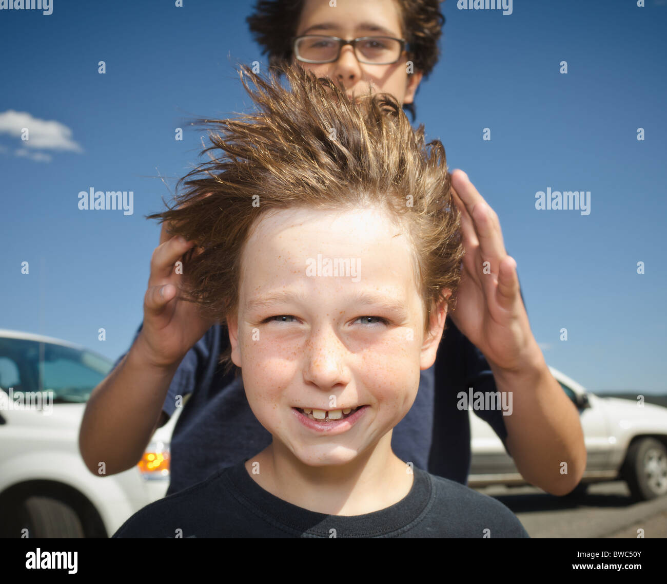 Boys hair blowing in the wind stock photo alamy