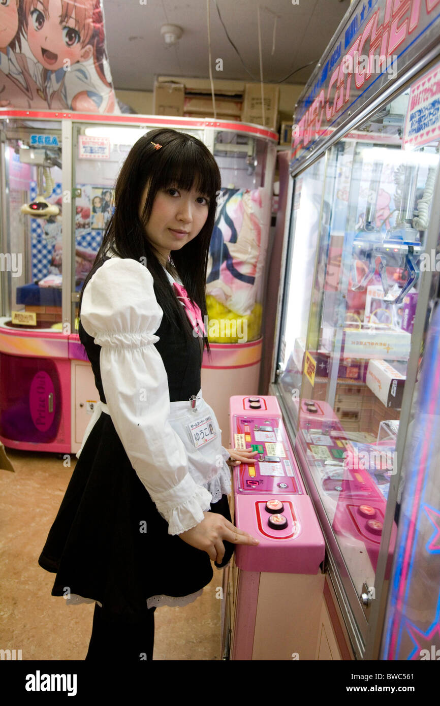 Young girl at cosplay, anime, manga and role-playing games shop in Akihabara, Tokyo, Japan. Stock Photo
