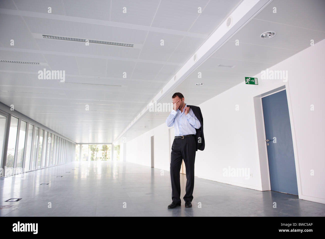 Businessman in an empty open space Stock Photo