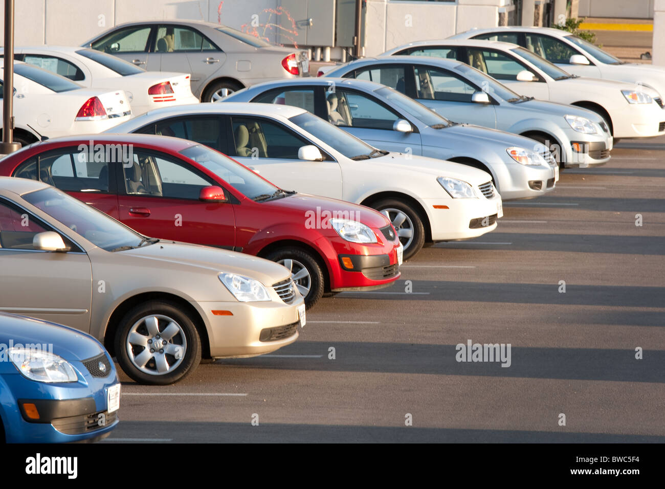 New cars, same model in different colors, on Chevrolet dealership's lot in San Angelo, Texas Stock Photo