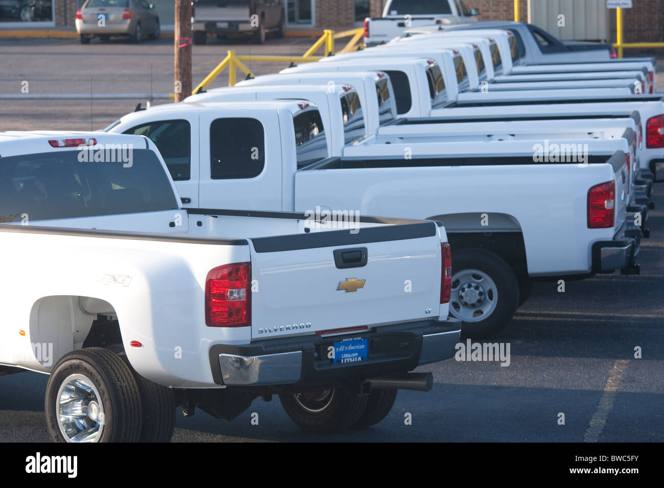 New white pickup trucks on Chevrolet dealership's lot in San Angelo