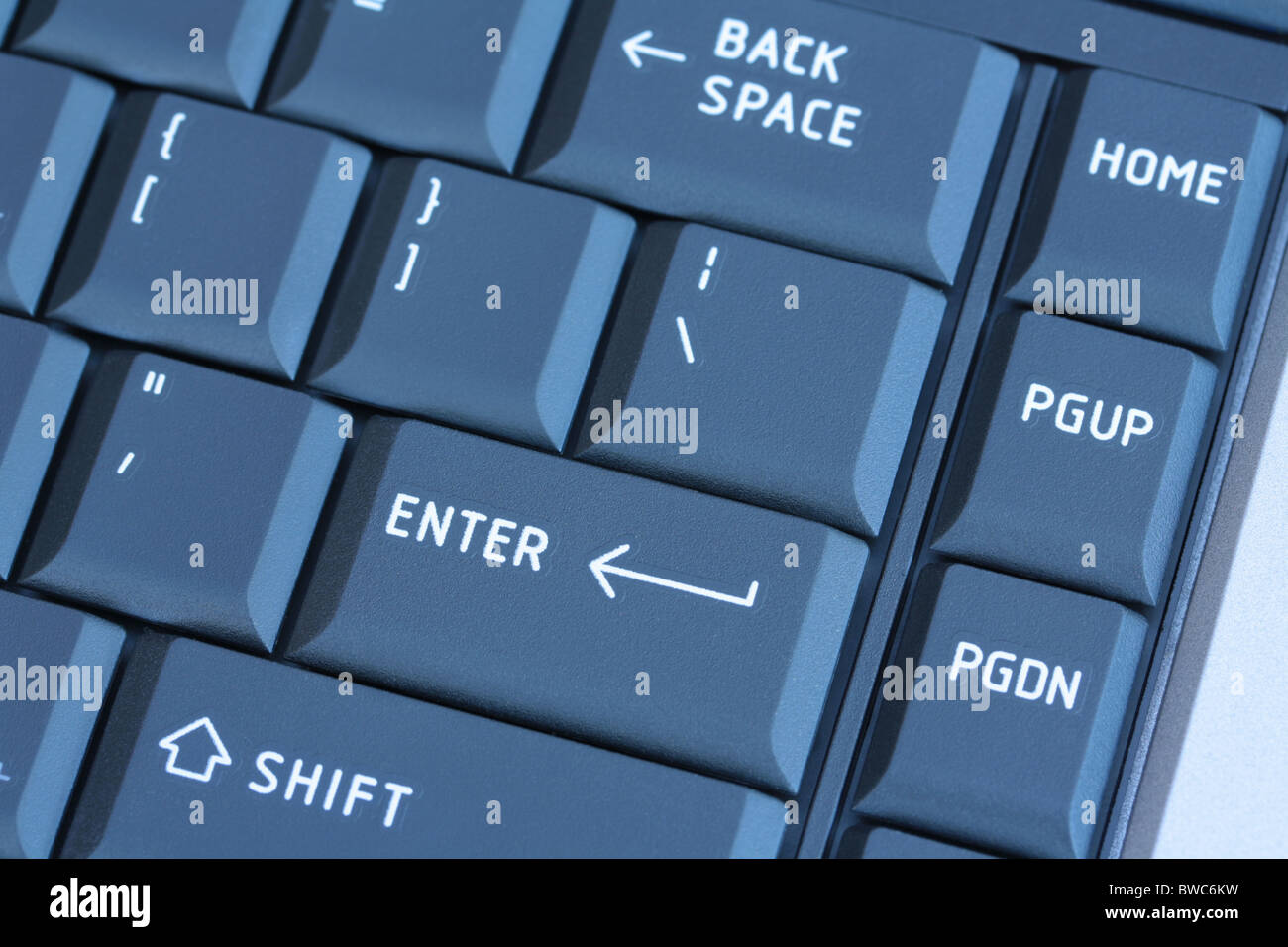 Laptop Keyboard in Blue Stock Photo