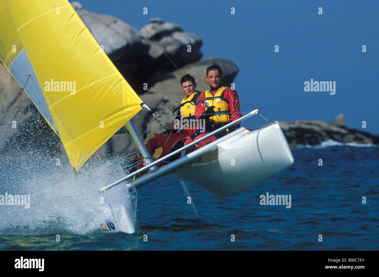 Learning to sail a New Cat 16 catamaran at sailing school
