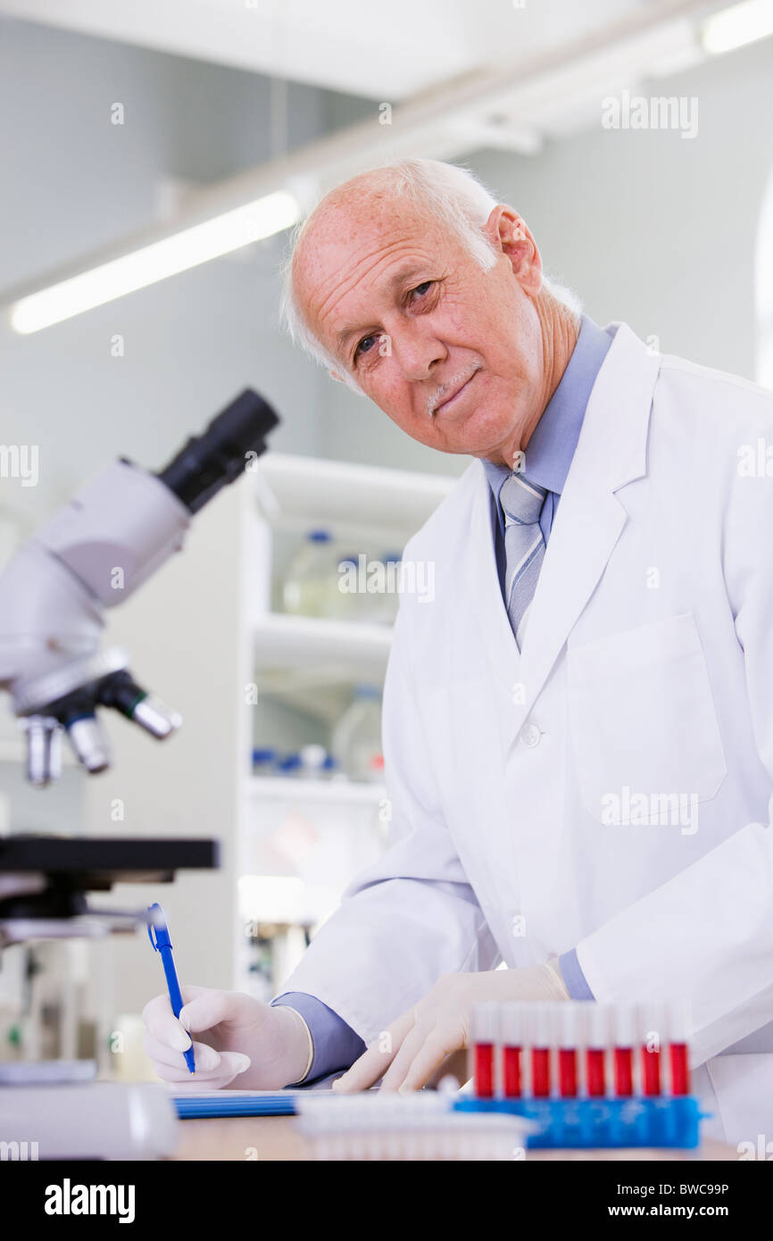 Male scientist doing research in laboratory, portrait Stock Photo - Alamy
