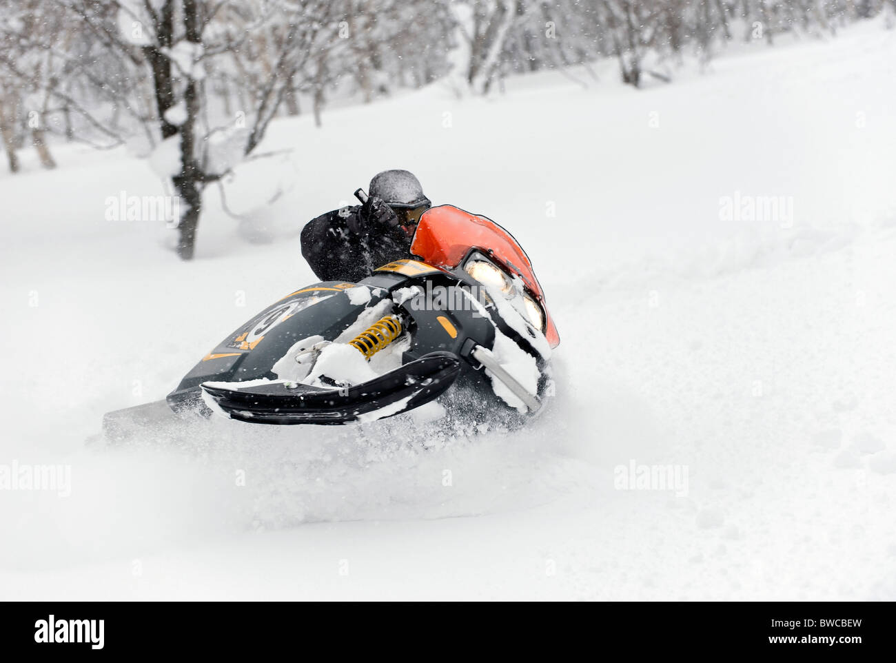 Man riding a snowmobile at Hanazono resort in Niseko, northern Japan on Feb. 6 2010. Stock Photo