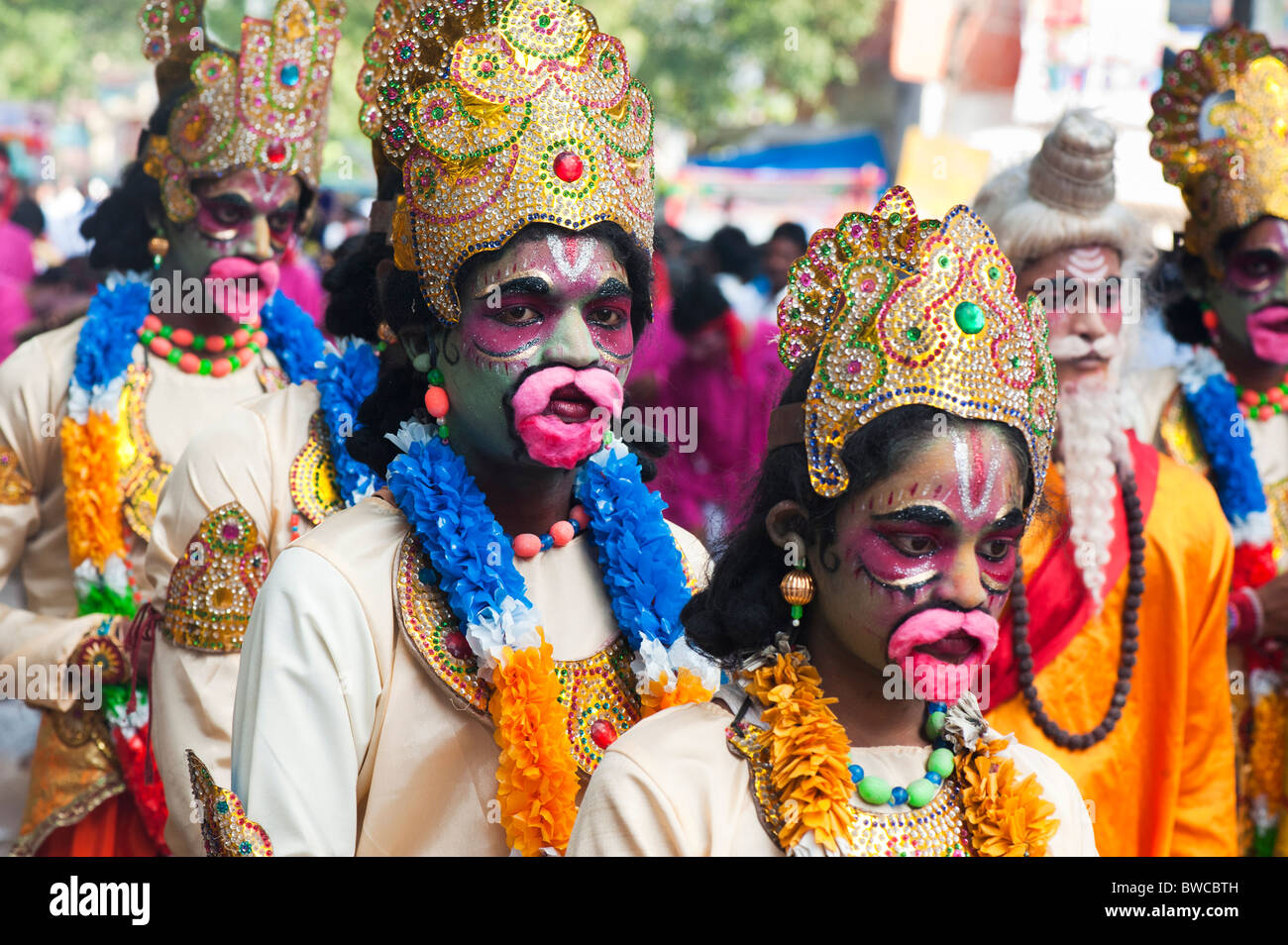 Indian festival street performers dressed as Hanuman, at Sathya Sai Baba 85th birthday celebrations in Puttaparthi, Andhra Pradesh, India Stock Photo