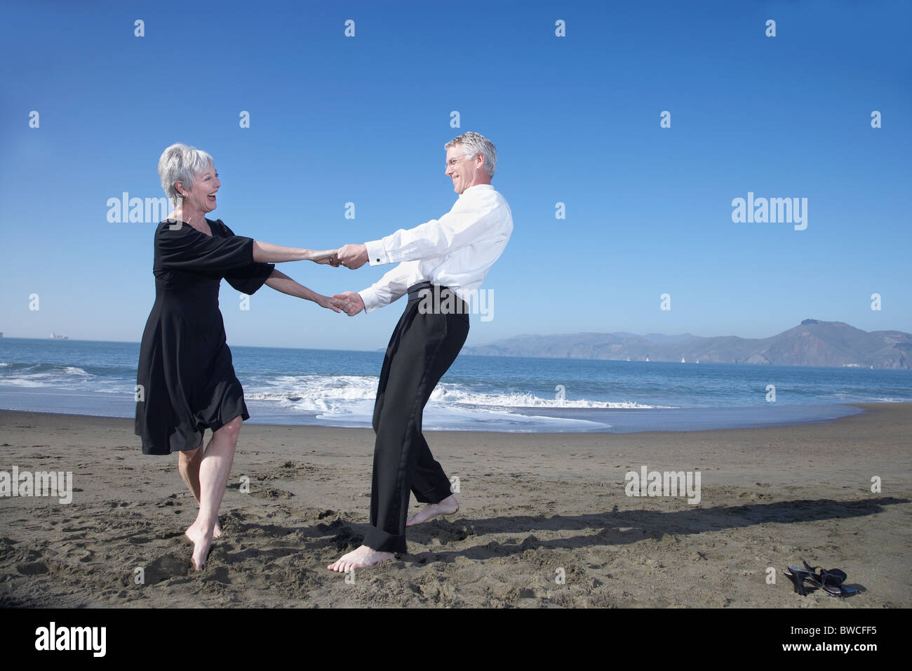 Woman dancing barefoot on sand hi-res stock photography and images - Alamy