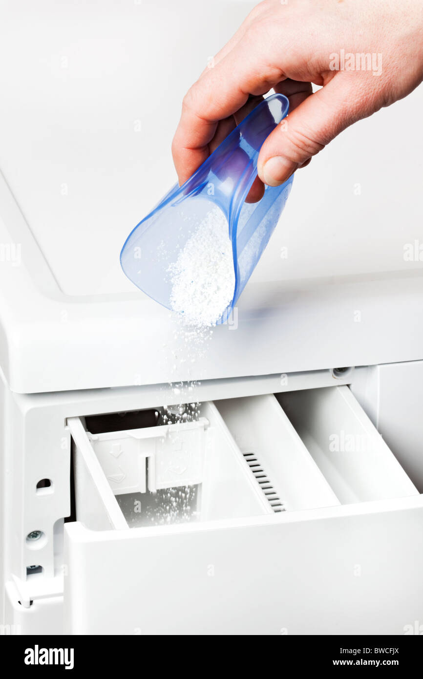 filling detergent in to the drawer of a washing machine Stock Photo Alamy