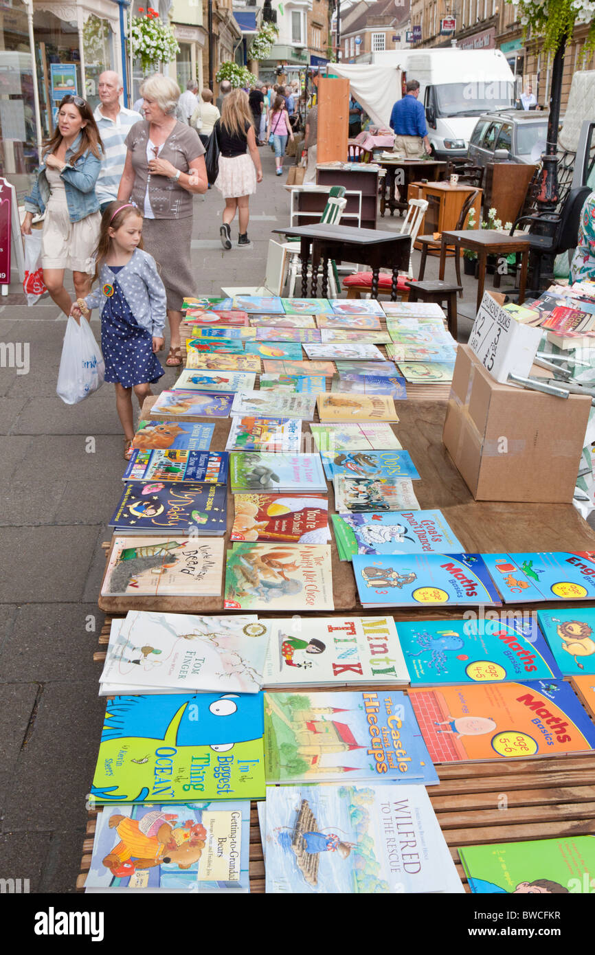 A book stall in the Saturday morning street market at Sherborne, Dorset Stock Photo