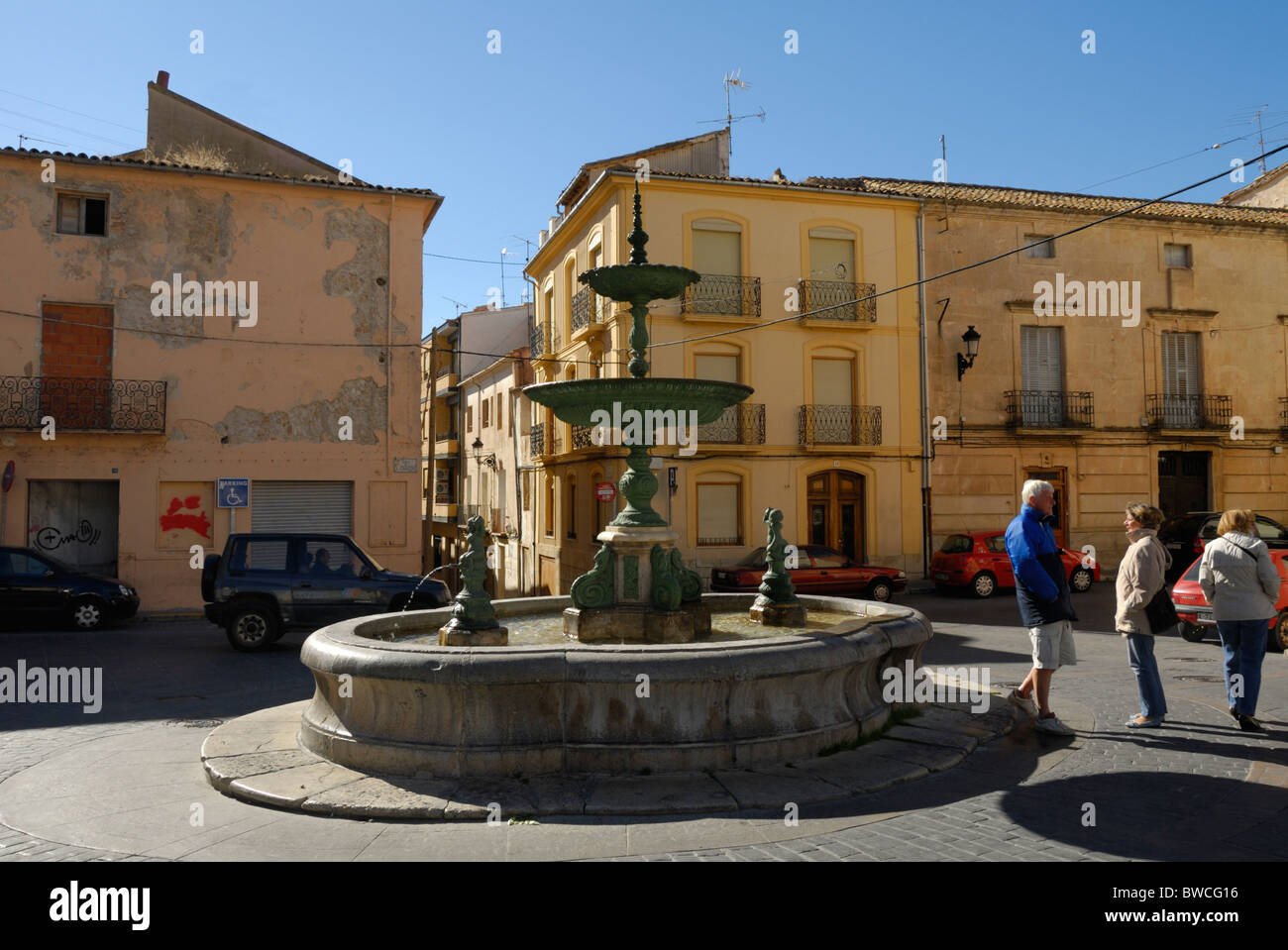 Tourists standing by fountain in Ibi, Valenciana, Spain Stock Photo
