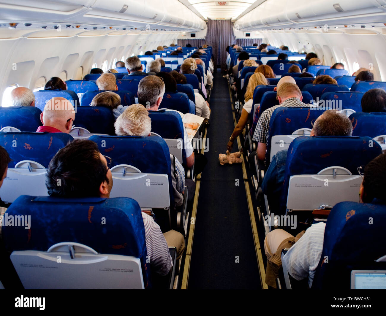 Crowded Spanair Airbus airplane flying from Stockholm Sweden to Barcelona Spain Stock Photo