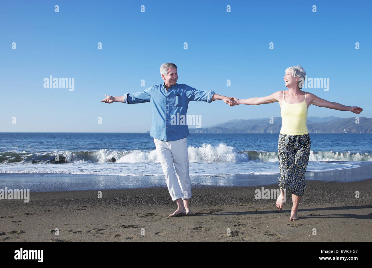 Woman dancing barefoot on sand hi-res stock photography and images - Alamy