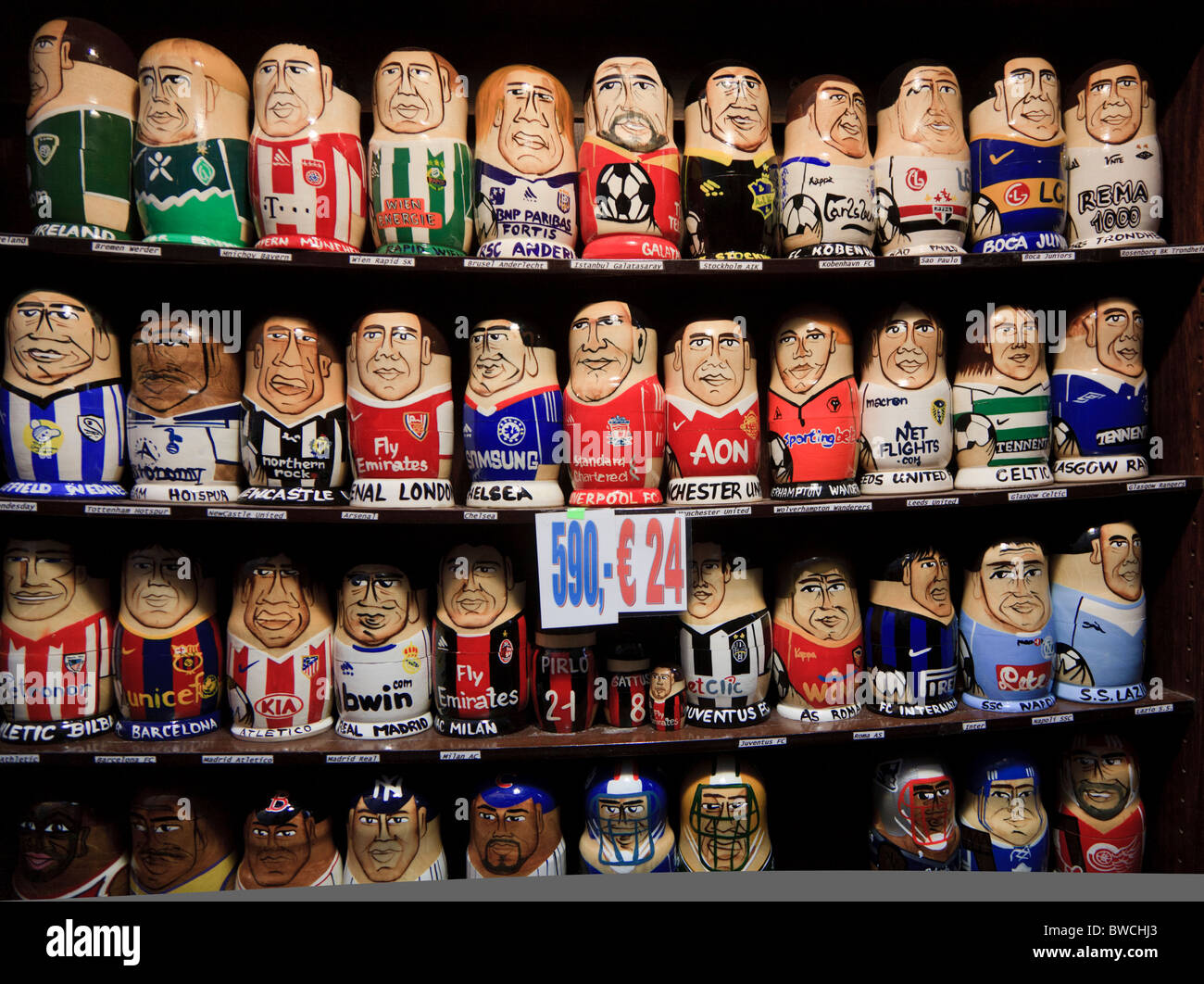 Russian dolls in the team strips of 