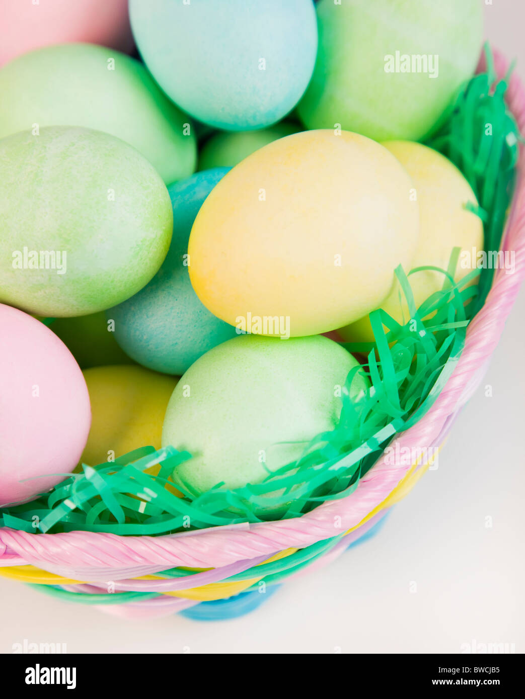 Studio shot of Easter eggs in basket Stock Photo