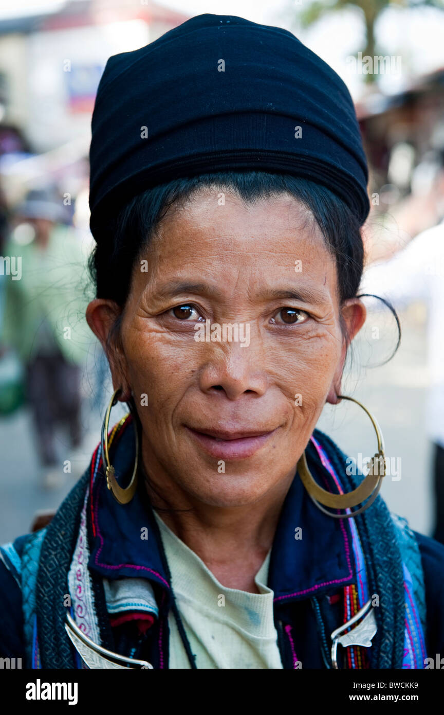 Woman from the Black H'mong tribe wearing traditional indigo blue clothing. North Vietnam Stock Photo