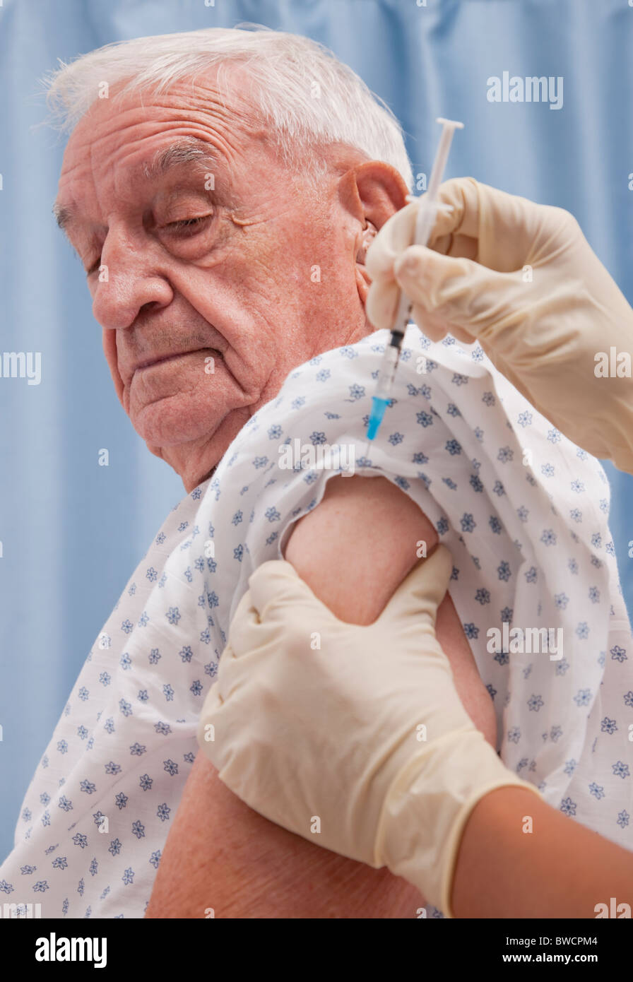USA, Illinois, Metamora, Senior man receiving injection Stock Photo
