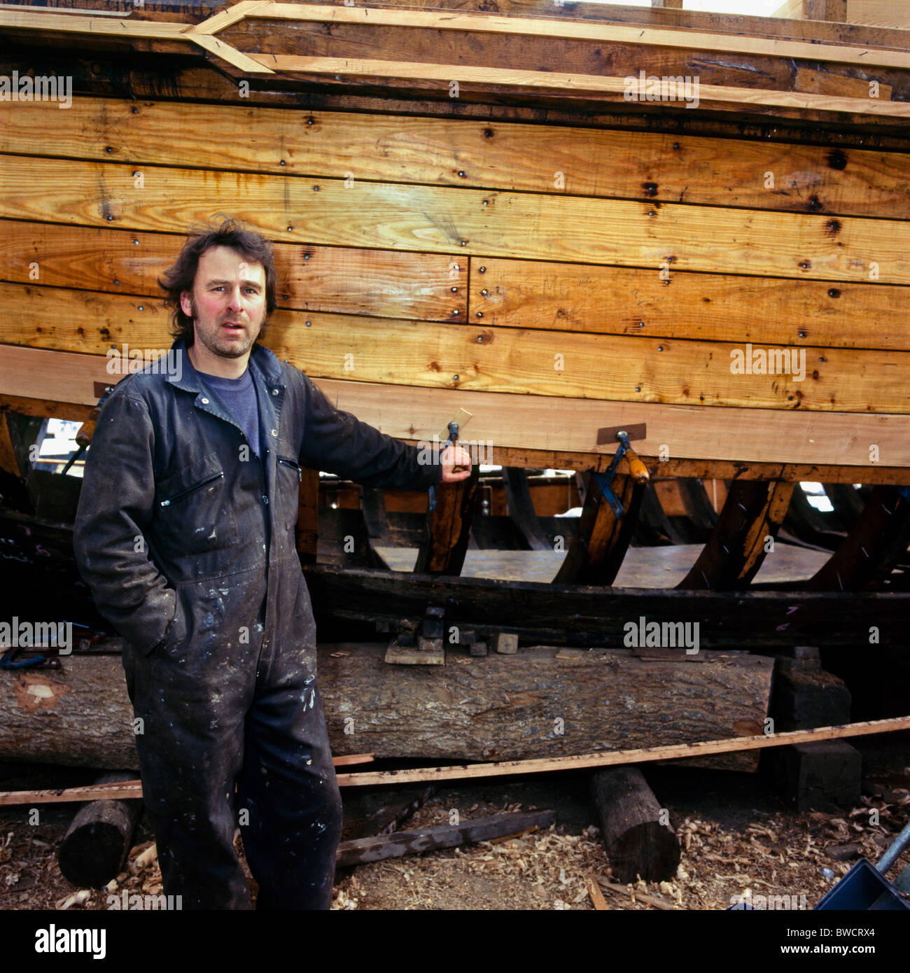 Cornwall, Newlyn, boat builder in workshop Stock Photo