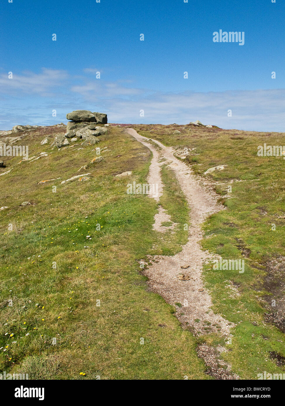 Soil erosion damage to the South West Coastal Path in Cornwall caused by walkers. Stock Photo