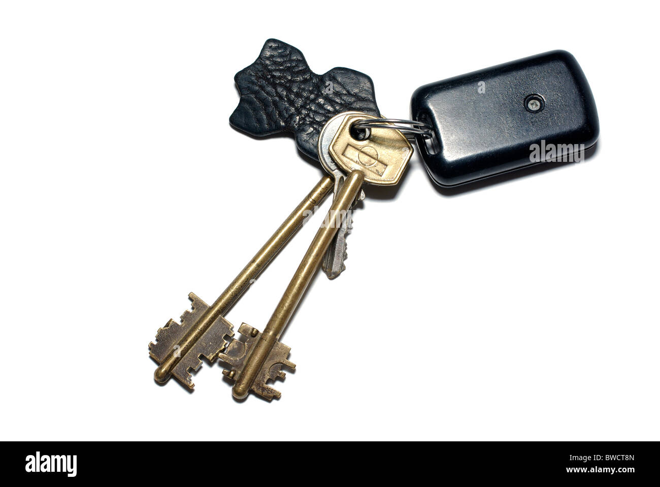 Keys with breloque isolated on white background. Stock Photo