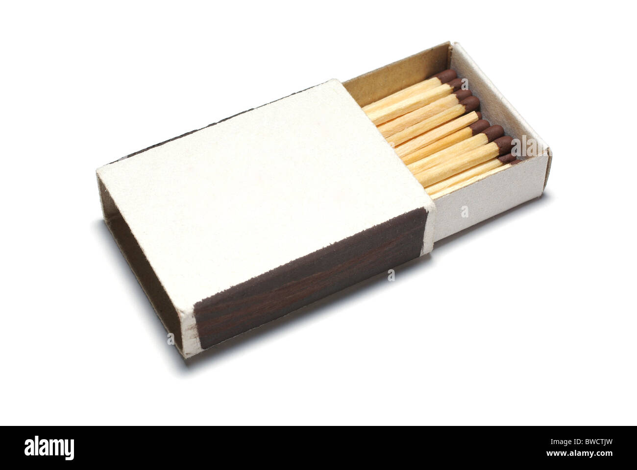 Matches in opened box isolated on white background. Stock Photo