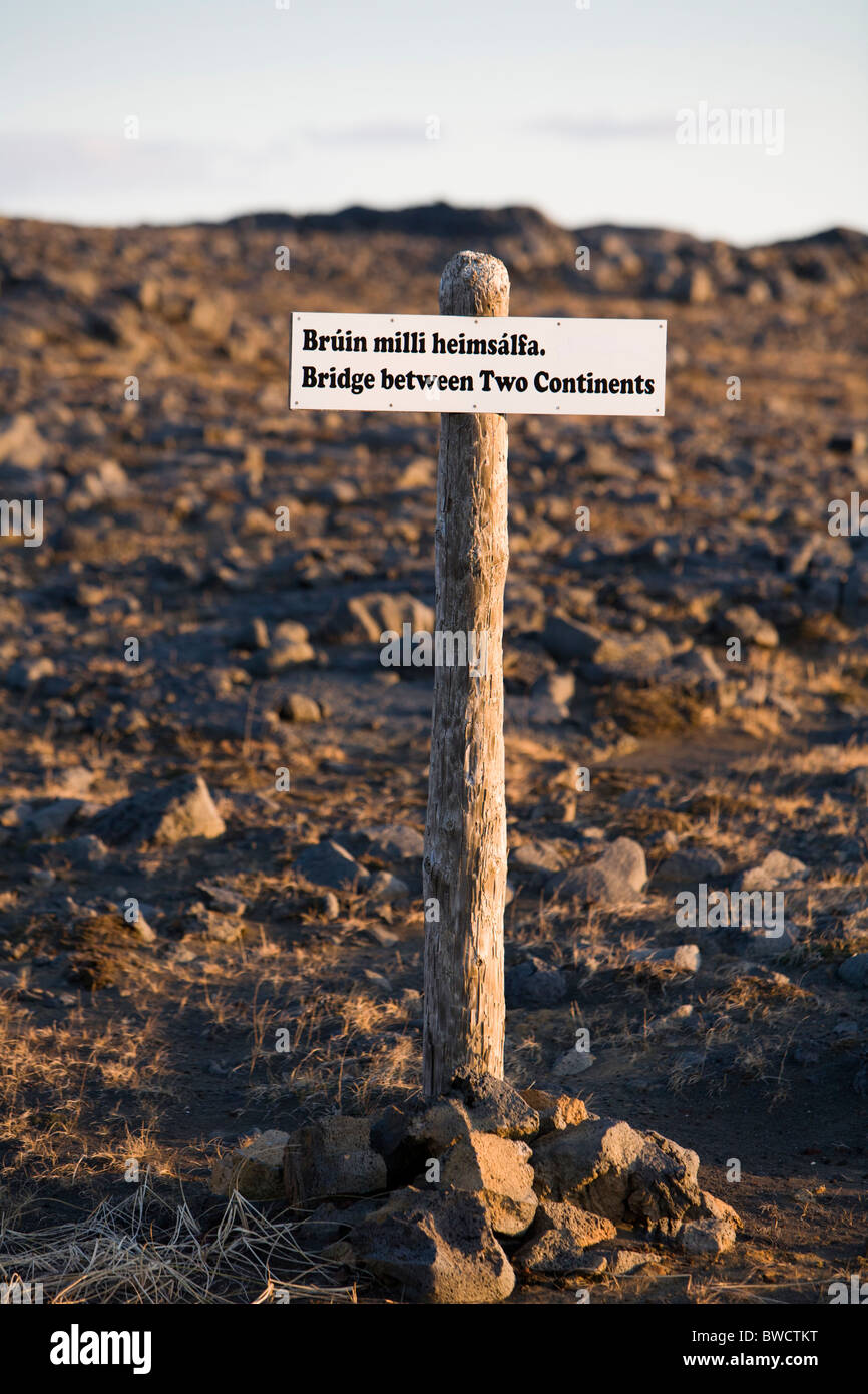 Sign saying 'bridge between two continents', near the town of Hafnir, Southern Peninsula (Reykjanes), Iceland. Stock Photo