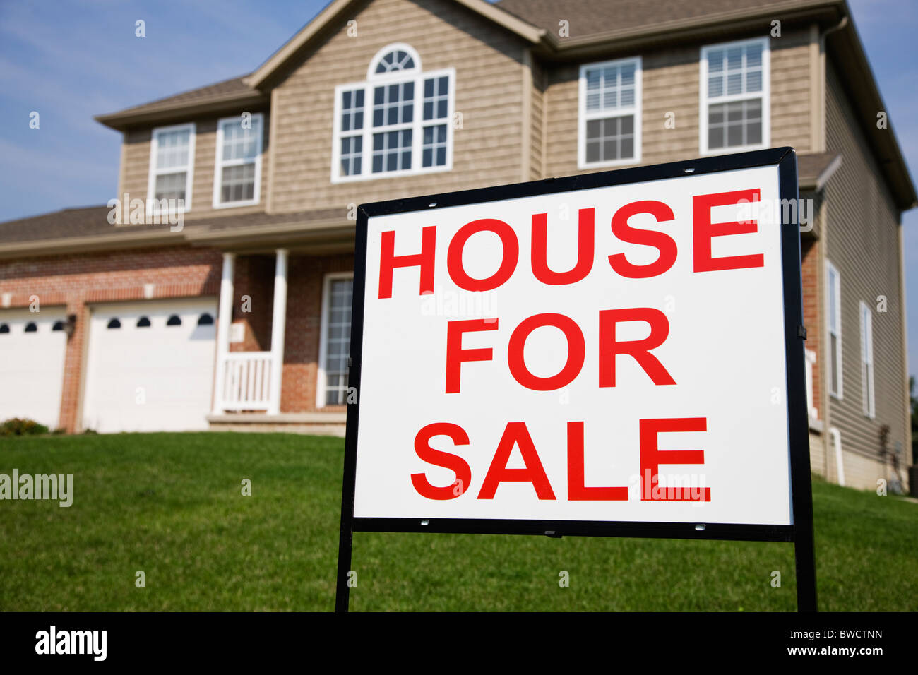 USA, Illinois, Metamora, For sale sign in front of house Stock Photo