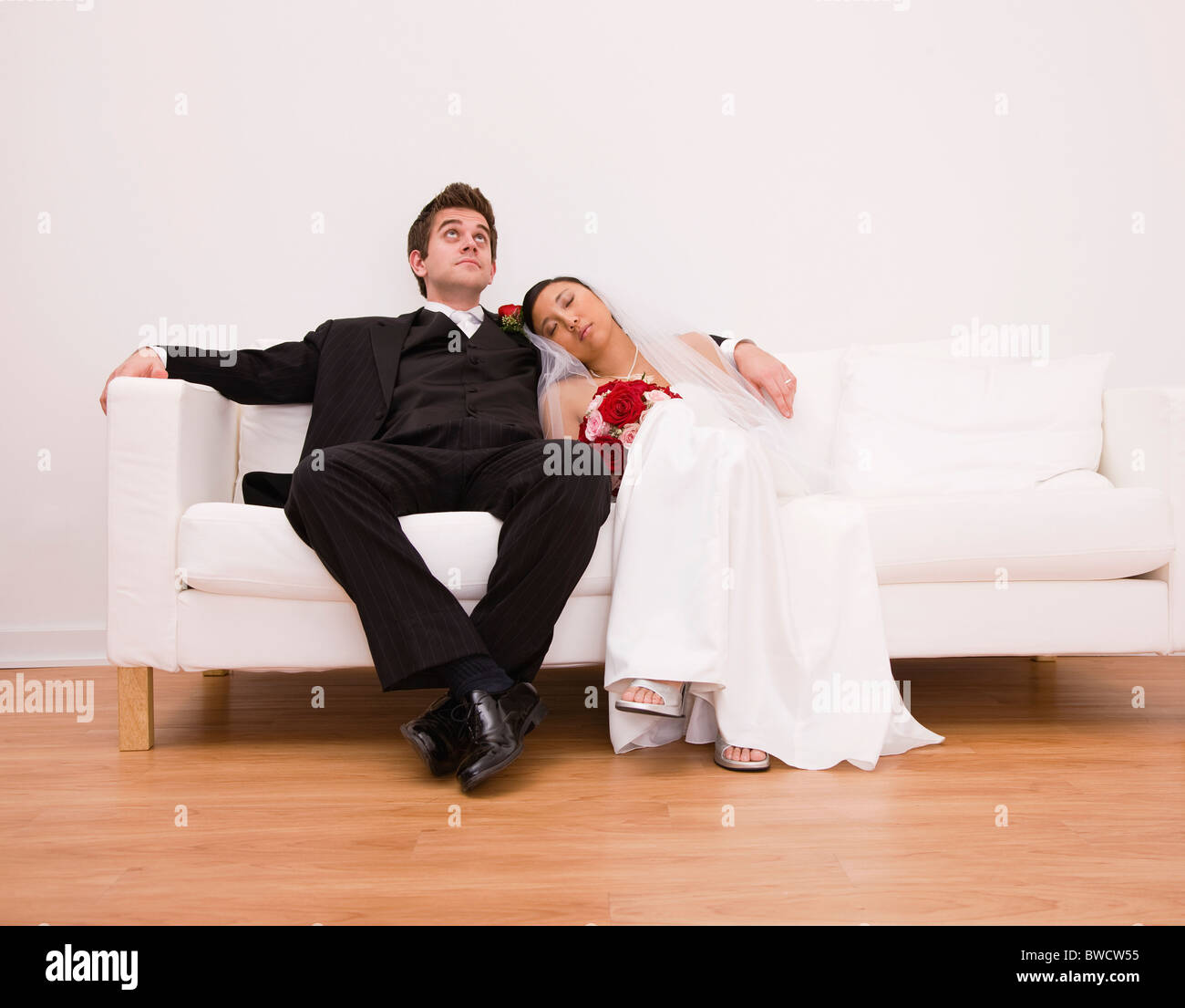 Bride sitting on couch hi-res stock photography and images - Alamy
