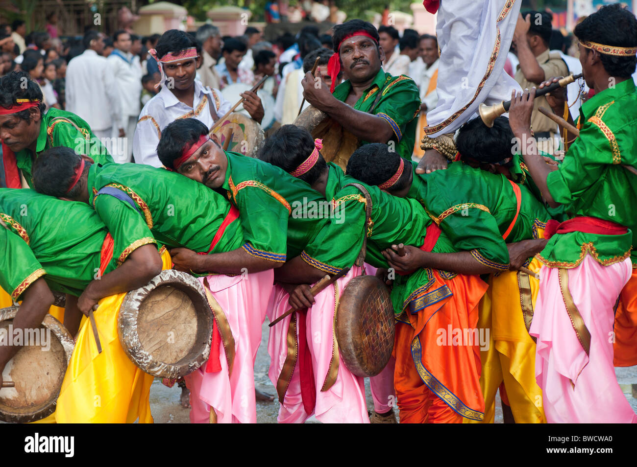 Indian festival drumming street performers at Sathya Sai Baba 85th birthday celebrations in Puttaparthi, Andhra Pradesh, India Stock Photo