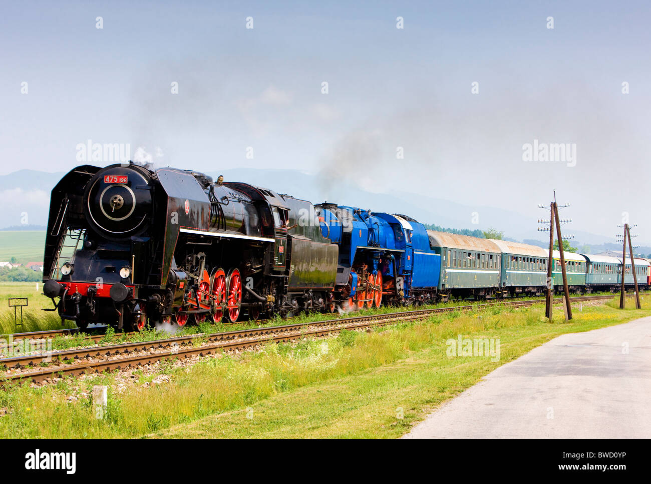 passenger train with steam locomotives (475.101+498.022), Strazovske Vrchy, Slovakia Stock Photo