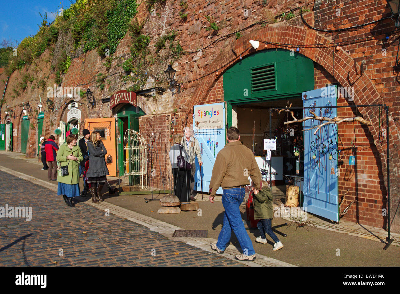 Craft shops in the old cellars, quayside, Exeter, Devon, England Stock Photo