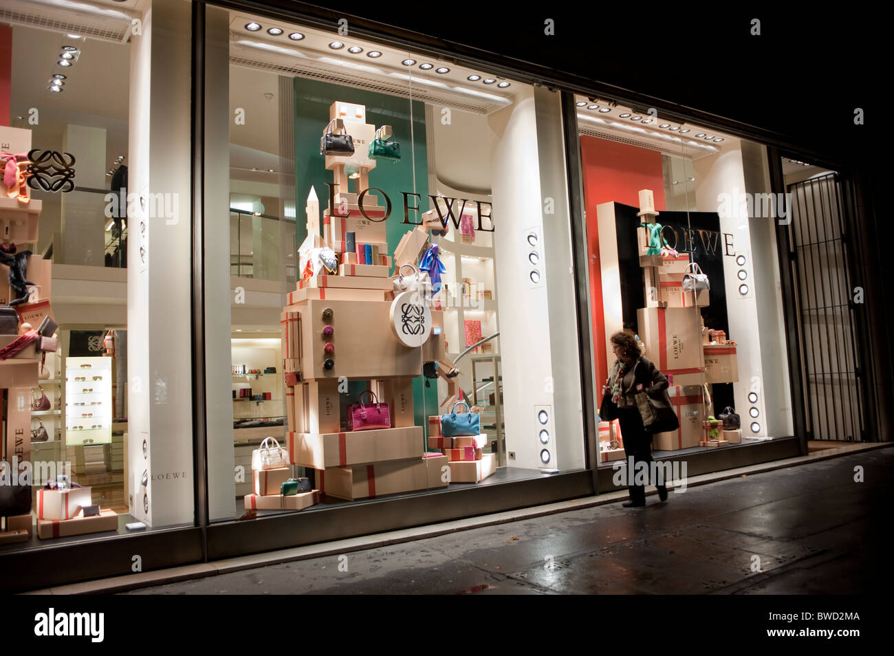 Paris, France,  Shop Front Window Display at Night, Luxury Brand Clothes, on Avenue Montaigne, Loewe Store Stock Photo