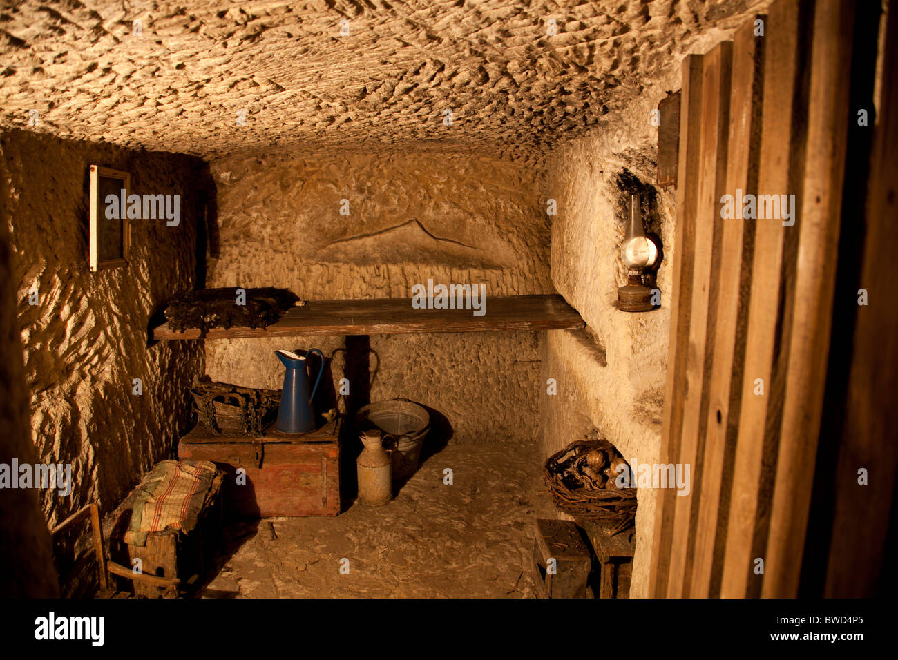 A private cubicle with period furniture in a former underground bomb shelter now opened as a historic attraction in Malta. Stock Photo