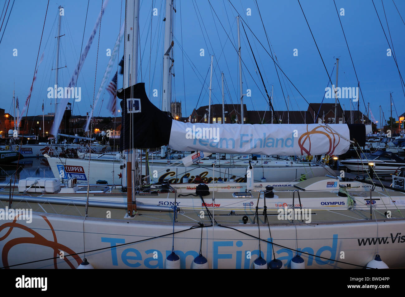 Clipper Race yachts moored in Hull Marina at dusk, East Yorkshire, England Stock Photo