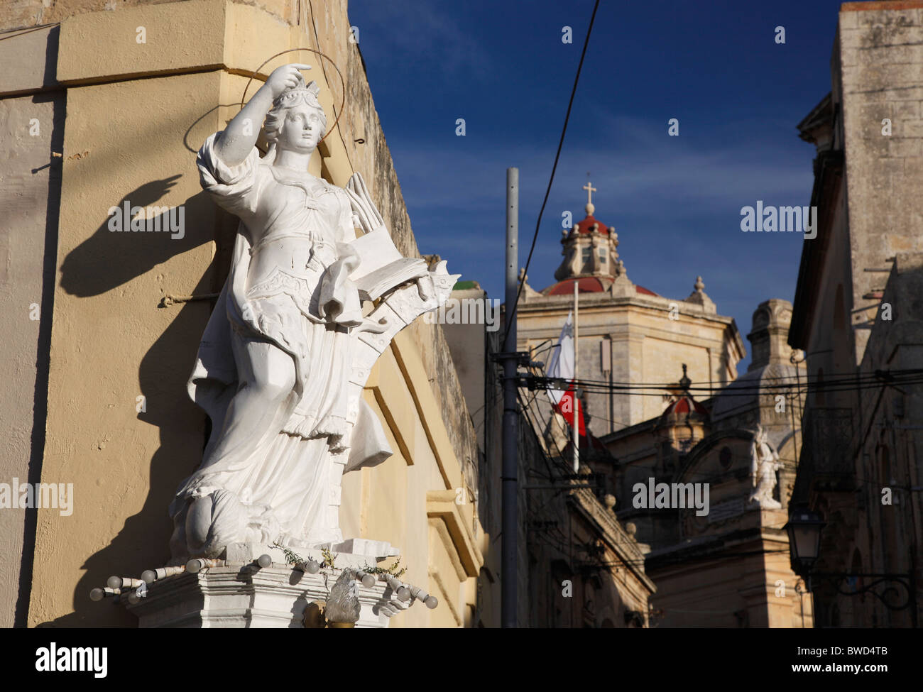 An old statue of the medieval saint St Catherine of Alexandria and the ...
