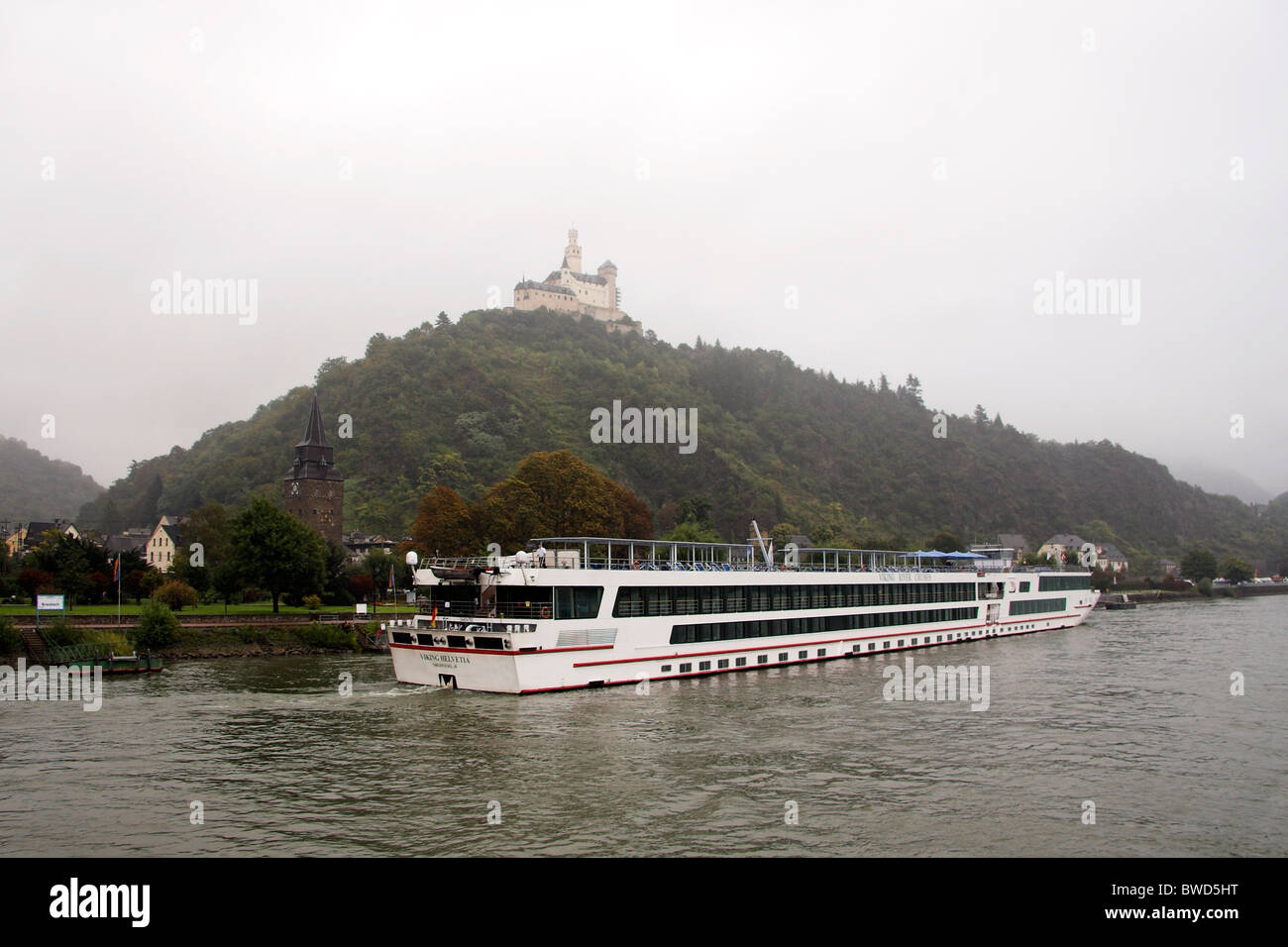 Viking river cruise boat passing Braubach, on the Rhine River, with