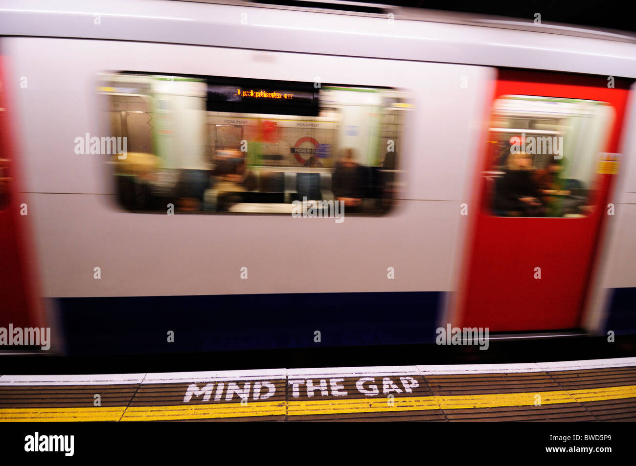 Mind the Gap safety warning notice at Monument Underground Tube Station, London, England, UK Stock Photo
