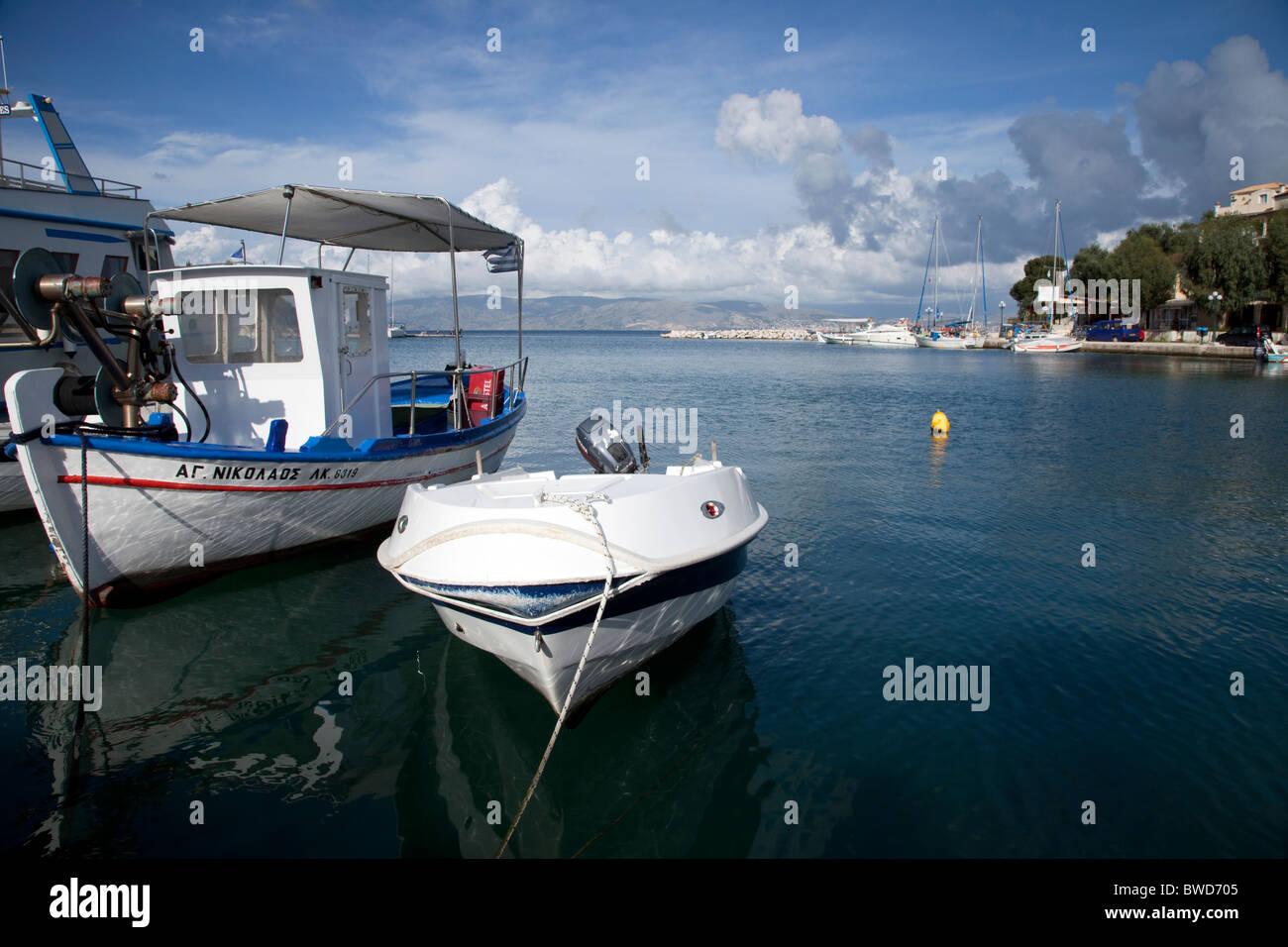 Boats on quiet sea hi-res stock photography and images - Alamy