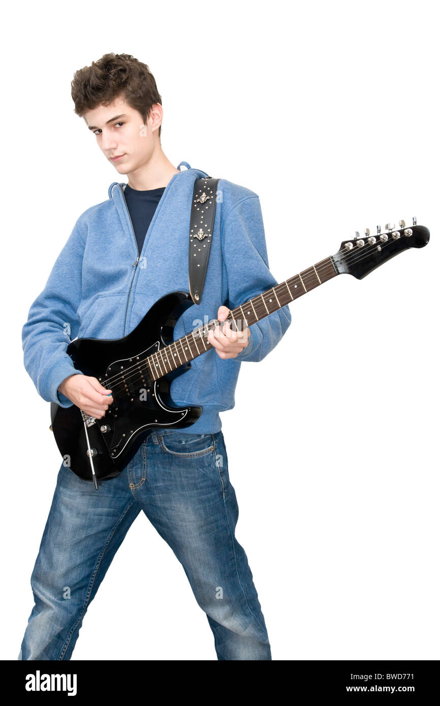 Teenager playing electric guitar on white background Stock Photo