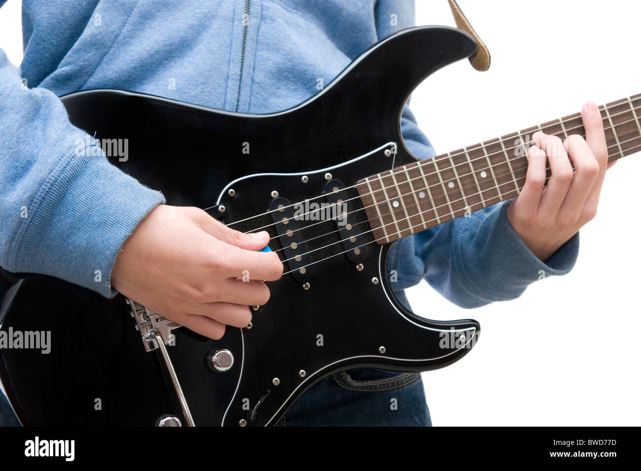 Teenager playing electric guitar on white background Stock Photo